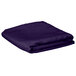 A folded purple Intedge rectangular table cover.