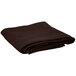 A folded brown Intedge cloth table cover.