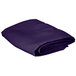 A folded purple Intedge square table cloth.