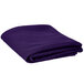A purple hemmed table cover folded on a white background.