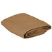A folded beige Intedge square table cover.