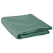A folded seafoam green Intedge table cover on a white background.