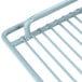 A white coated metal wire shelf with handles on the sides.