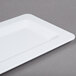 A white rectangular GET Milano melamine display tray.