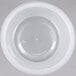 A Pactiv translucent plastic bowl with a lid on a grey surface.