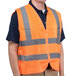 A Cordova orange high visibility safety vest with reflective stripes.