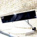 The Bromic Heating Platinum Smart-Heat Electric Patio Heater hanging from a ceiling.
