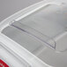 A clear plastic lid with a clear handle for a Rubbermaid ingredient bin.