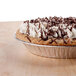 A chocolate pie with whipped cream on top in a D&W Fine Pack aluminum foil pie pan.