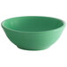 A green Tuxton China nappie bowl.