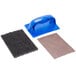 A blue plastic grill cleaning pad with a handle next to a black sponge pad.
