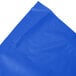 A folded blue plastic sheet on a white background.