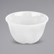 A white bowl of GET Diamond White Bouillon on a gray surface.