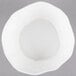 A 10 Strawberry Street bright white porcelain pinch bowl with a small hole in the middle.