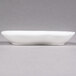A white rectangular 10 Strawberry Street porcelain plate with curved edges.