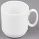 A 10 Strawberry Street Izabel Lam Pond white bone china espresso cup with a saucer on a gray surface.