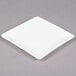 A 10 Strawberry Street white square bone china plate with a small square cut out.