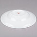 A white bone china pasta bowl with a wide rim and a red logo.