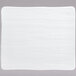 A bright white rectangular wood grain porcelain platter.