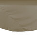 A beige Intedge poly/cotton blend table cover with a hemmed edge on a table.