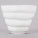 A 10 Strawberry Street bright white porcelain sorbet cup with wavy lines.