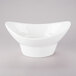 A white 10 Strawberry Street Whittier porcelain oval bowl with a curved edge.
