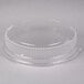 A clear plastic round high dome lid with a small hole in it.