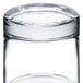 An Arcoroc clear glass with a round top.