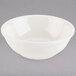 A Tuxton eggshell white china bowl.