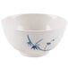 A white melamine rice bowl with blue bamboo design on it.