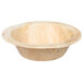 A wooden EcoChoice palm leaf bowl with a brown rim.