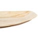 An EcoChoice oval palm leaf tray with a curved edge.