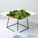 An American Metalcraft square melamine platter with a salad on it.