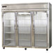 A Continental Refrigerator reach-in freezer with three glass doors.