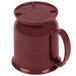 A red plastic mug with a handle and a lid.