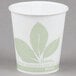 A white Bare by Solo wax-treated paper cold cup with green leaves printed on it.