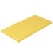 A yellow folded sheet of paper.