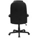A Flash Furniture high-back black leather office chair with leather padded arms and wheels.