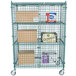 A green wire mesh Regency security cage with boxes on shelves.