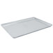 A Vollrath Wear-Ever full size aluminum bun/sheet pan on a counter.