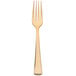 A close up of a Fineline gold plastic fork.