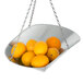 A metal bowl of oranges hanging from a Cardinal Detecto Hanging Scoop Scale.