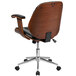 A wooden office chair with a black leather seat.
