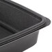 A black Genpak rectangular plastic container with a lid.