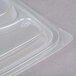 A close up of a clear plastic Genpak Smart-Set Pro lid on a clear plastic container.
