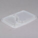 A Genpak clear plastic rectangular lid with two compartments.