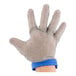 A hand wearing a San Jamar stainless steel mesh glove.
