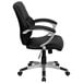 A black office chair with chrome arms and wheels.