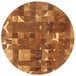 A Tablecraft acacia wood end grain chopping board with a circular pattern of squares.
