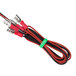 A red and black cable with two green wires connected to a white cable.